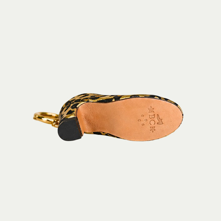 Charm fantasia oro y negro